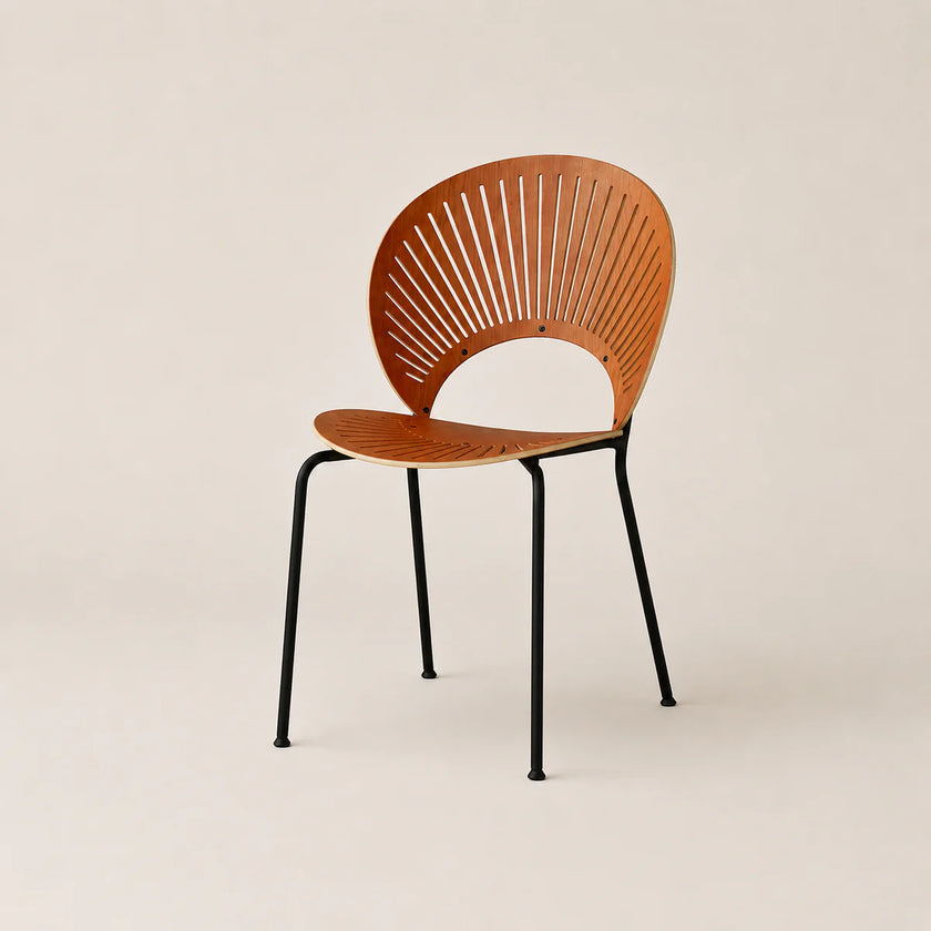 Wooden chair with black metal legs on a beige background