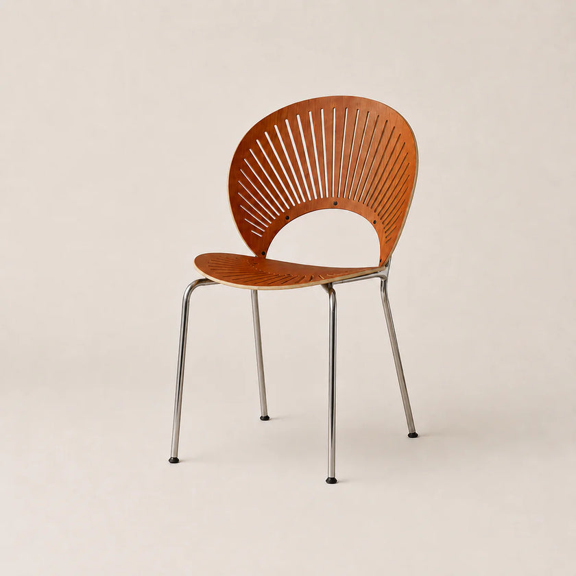 Wooden chair with metal legs on a beige background