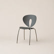 Modern chair with a unique design on a beige background