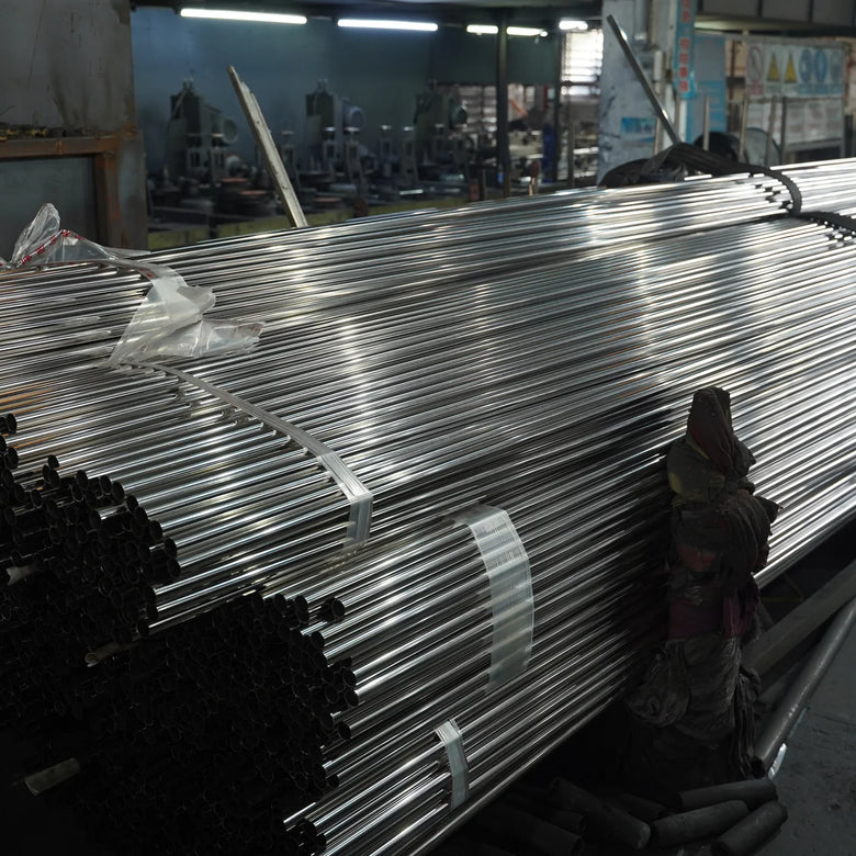 Stack of metal rods in a workshop setting