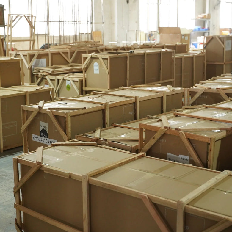 Storage room with stacked cardboard boxes and crates.