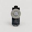 A replacement button component for a device, featuring a round silver metallic button with a textured outer ring, mounted on a black plastic housing, shot against a light gray background.