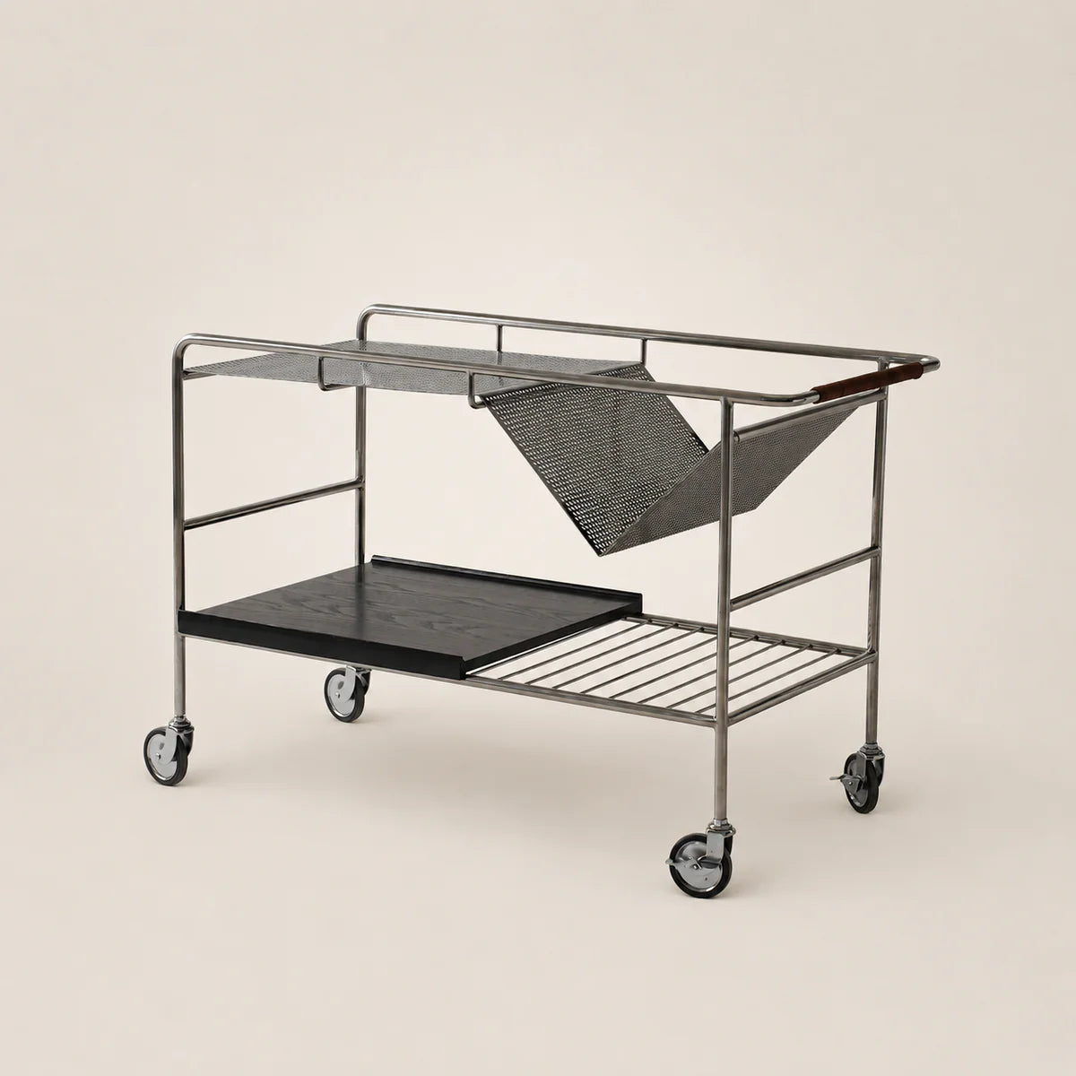 Metal trolley with shelves on a beige background