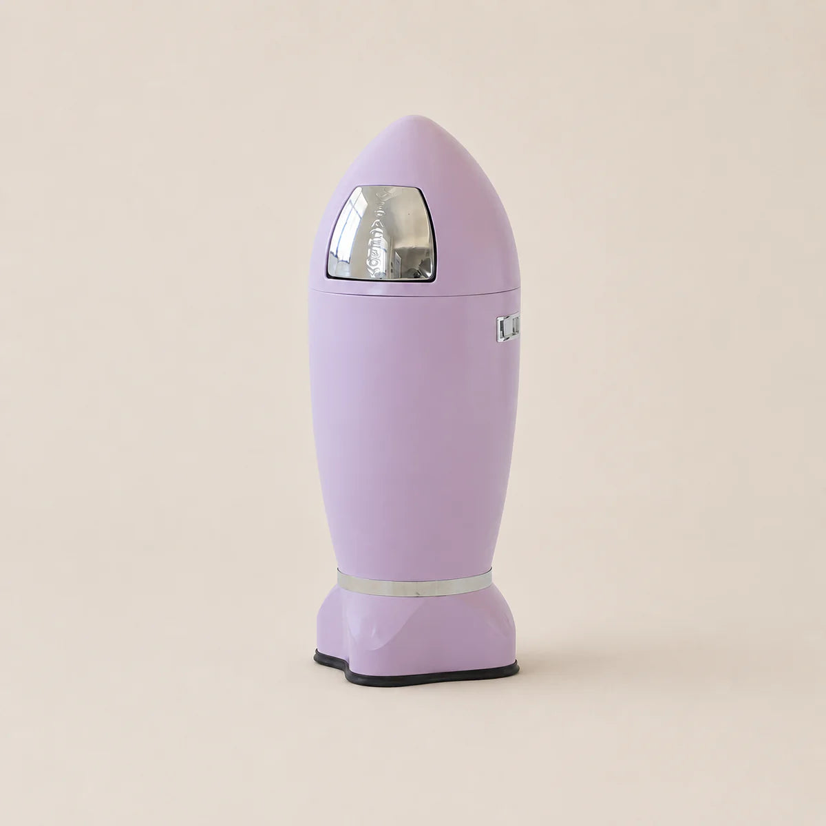 Purple cylindrical device with a reflective surface on a beige background