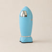 Blue retro-style trash can on a beige background