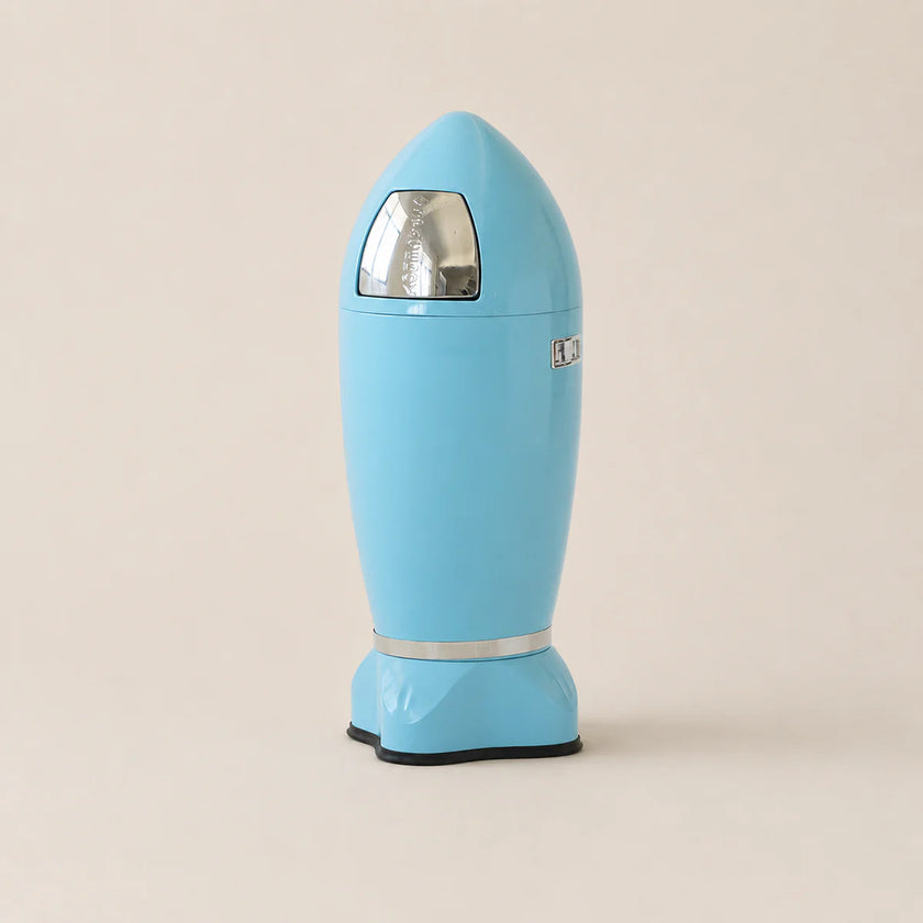 Blue retro-style trash can on a beige background