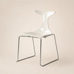 Modern white chair with a transparent backrest on a beige background