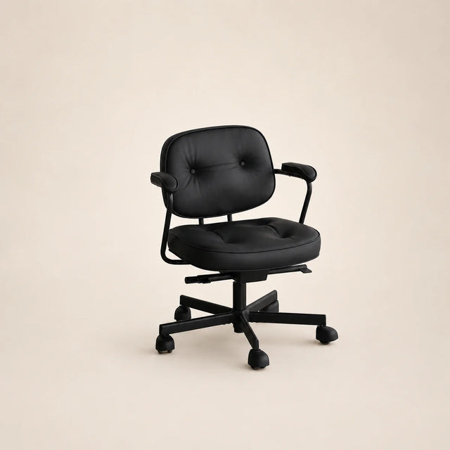 Black office chair on a beige background