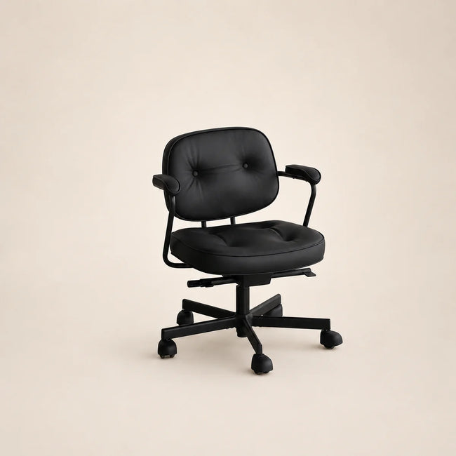Black office chair on a beige background