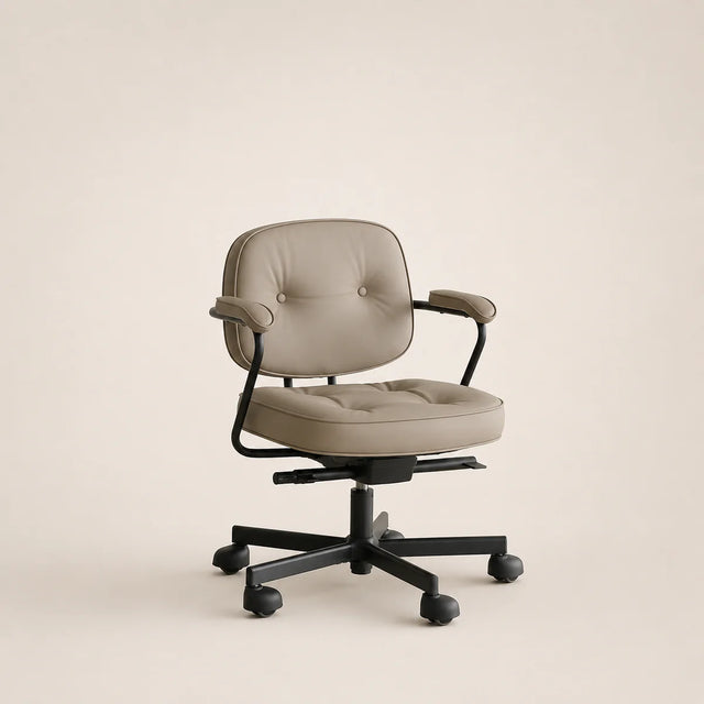 Beige office chair with black base on a beige background