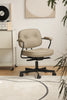 Beige office desk swivel arm chair in a room with a record player and abstract art on the wall.