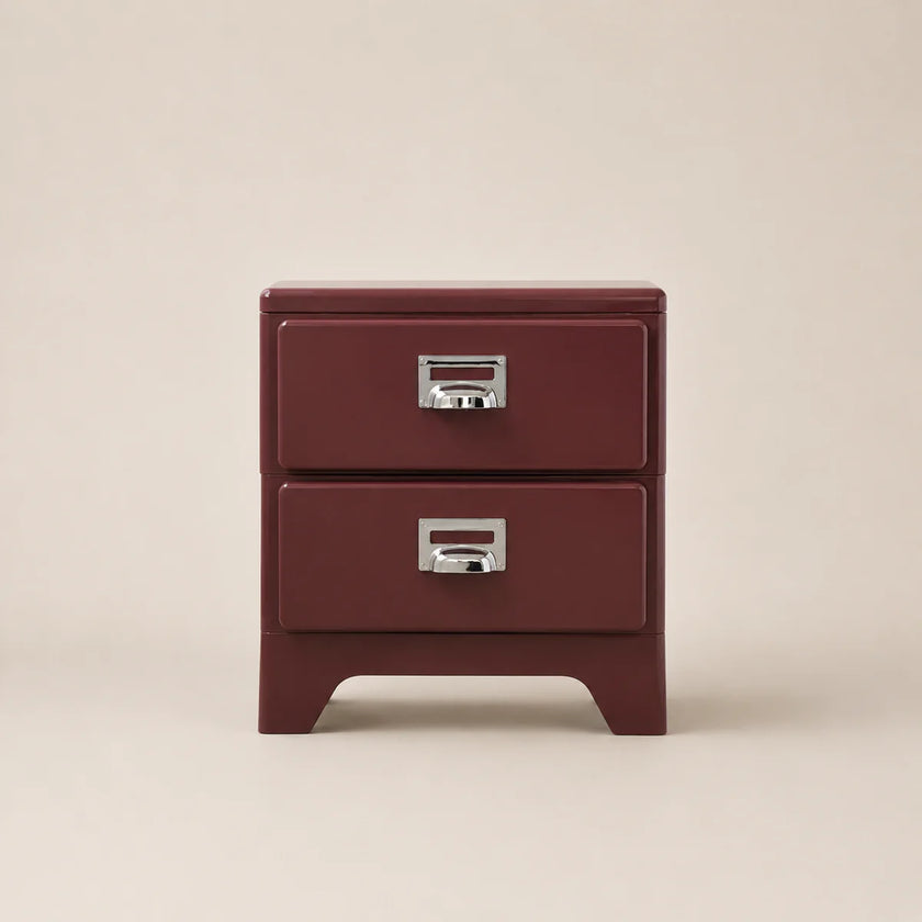 Red two-drawer nightstand with silver handles on a beige background