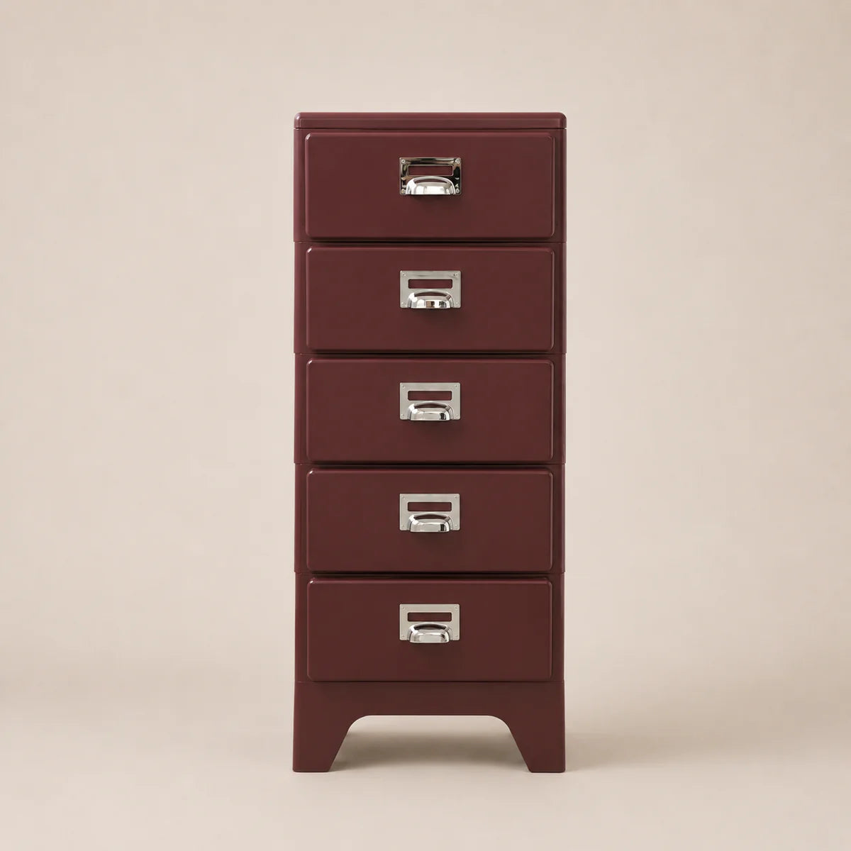 Red metal file cabinet with four drawers on a beige background