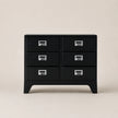 Black dresser with six drawers on a beige background