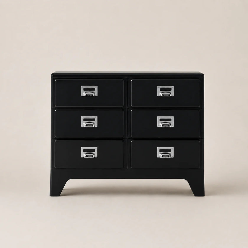 Black dresser with six drawers on a beige background
