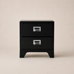 Black two-drawer nightstand with metal handles on a beige background
