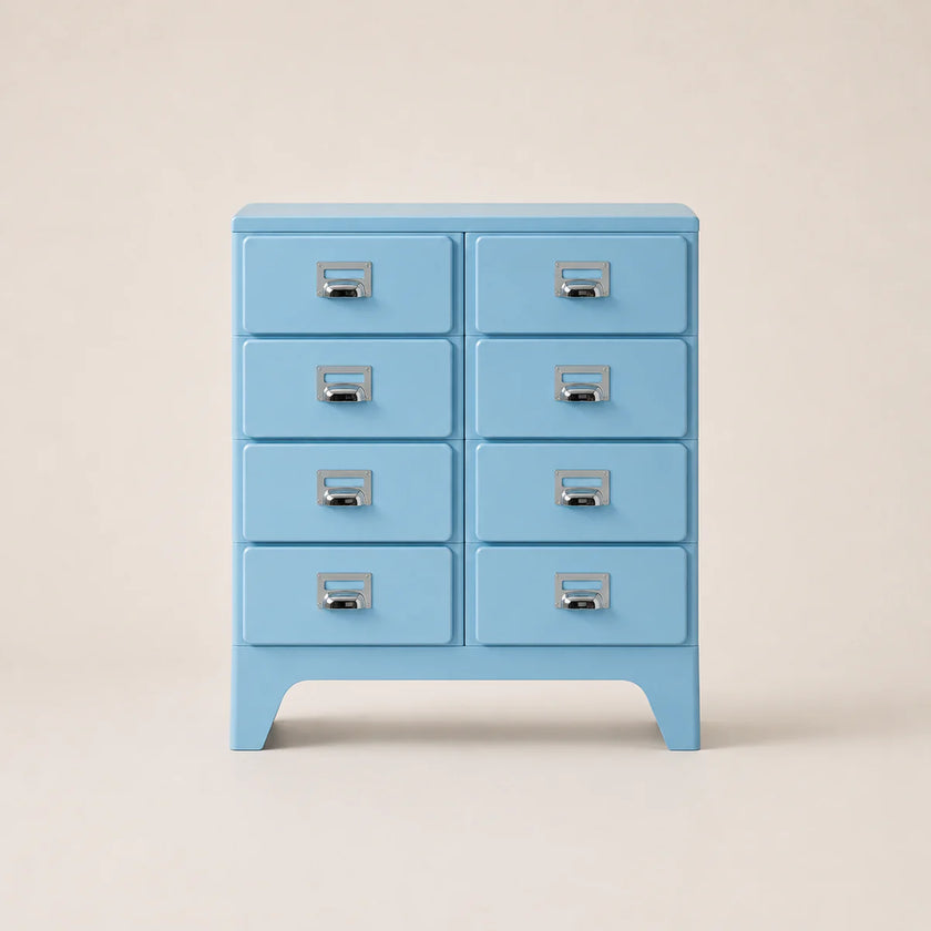 Light blue chest of drawers with six drawers on a beige background