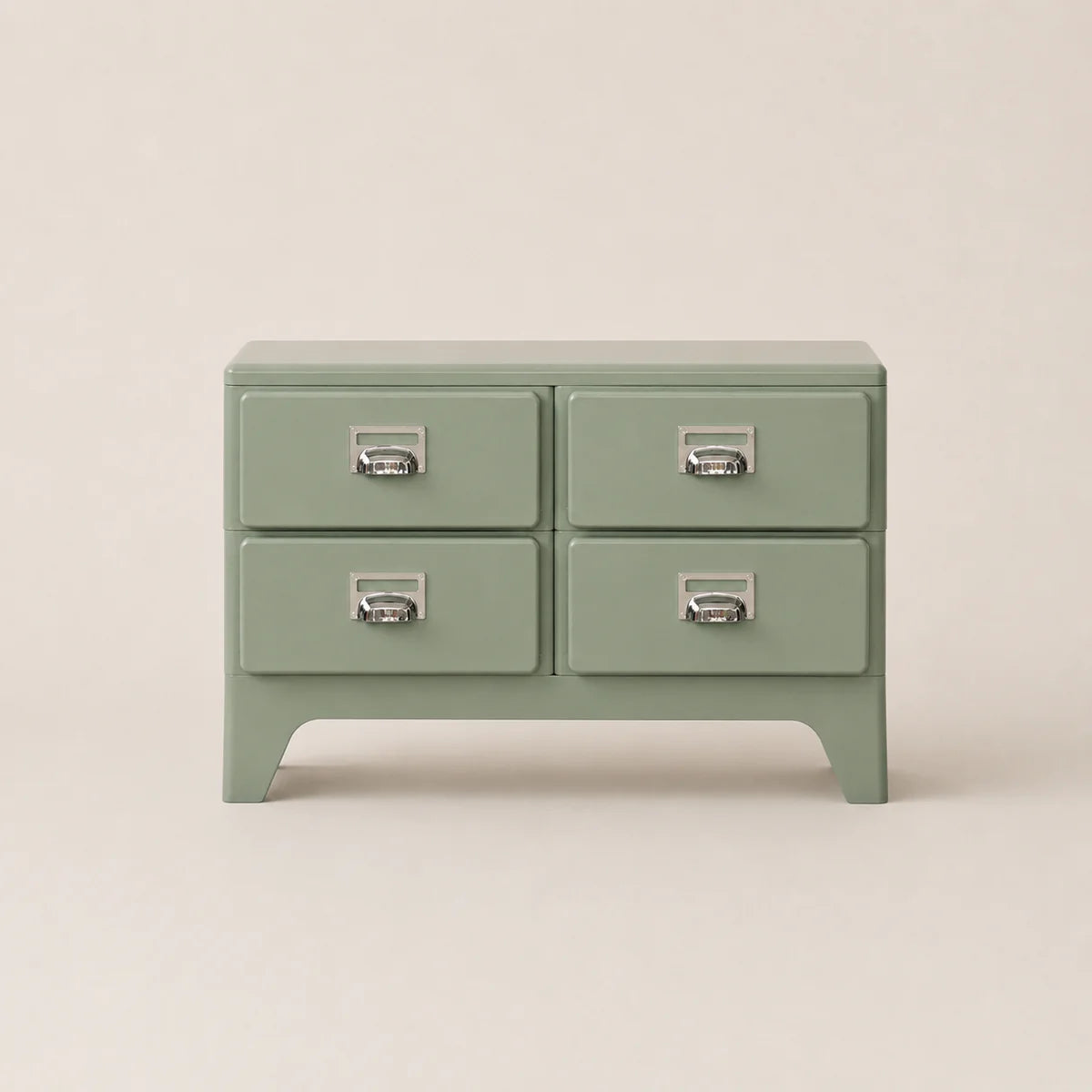Green dresser with four drawers on a beige background
