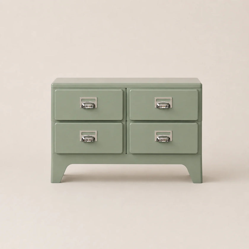 Green dresser with four drawers on a beige background