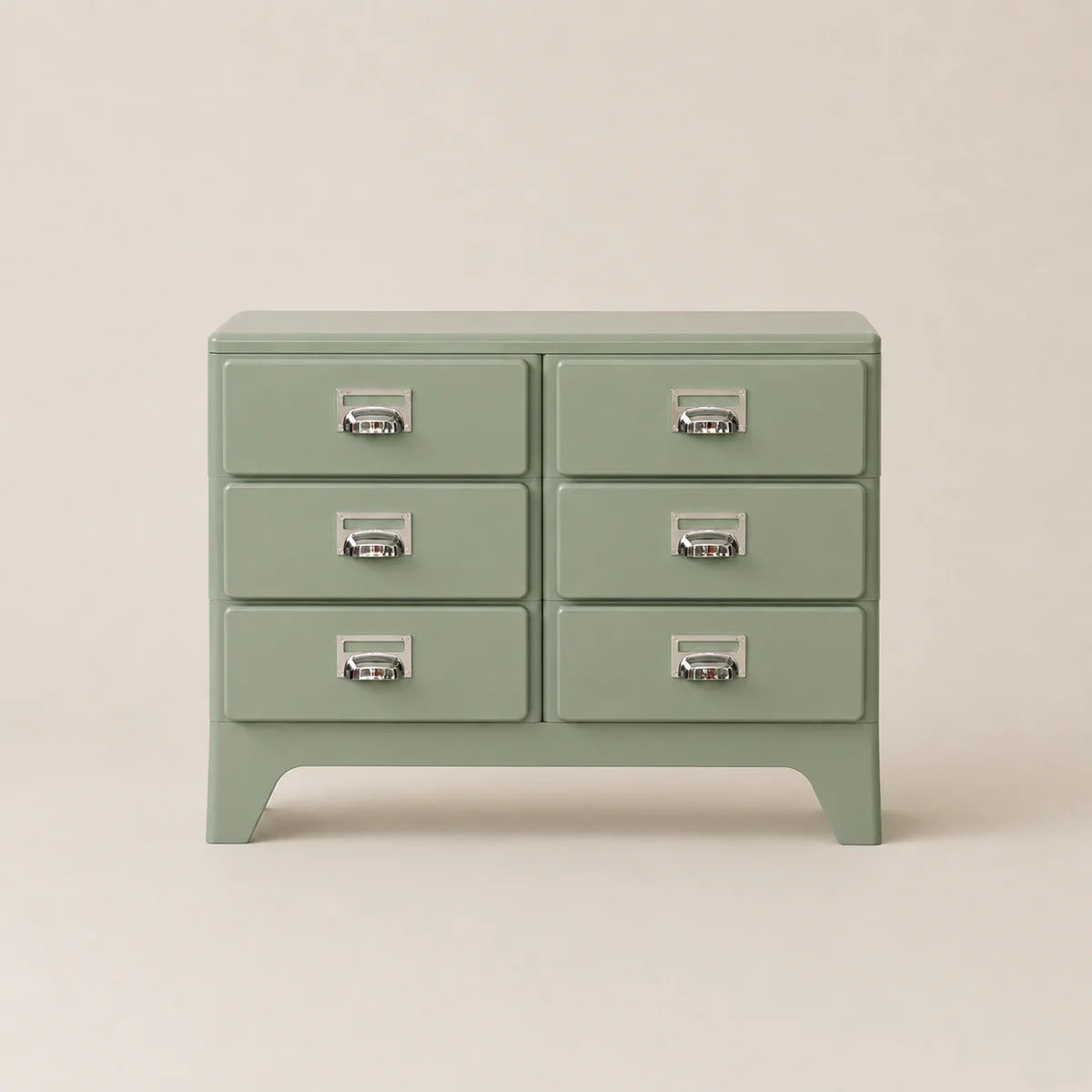 Green dresser with six drawers on a beige background