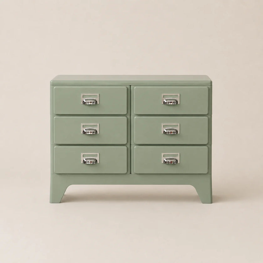 Green dresser with six drawers on a beige background