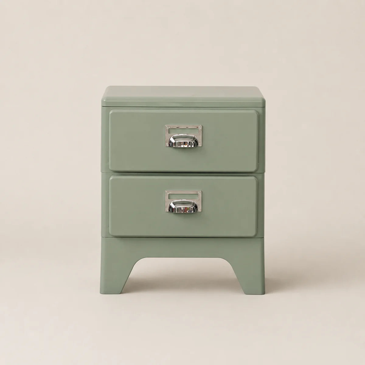 Green metal nightstand with two drawers on a beige background