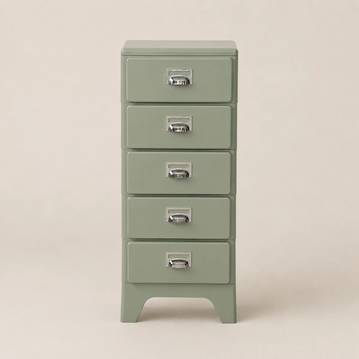 Green metal file cabinet with four drawers on a beige background