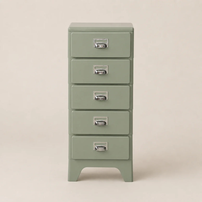 Green metal file cabinet with four drawers on a beige background