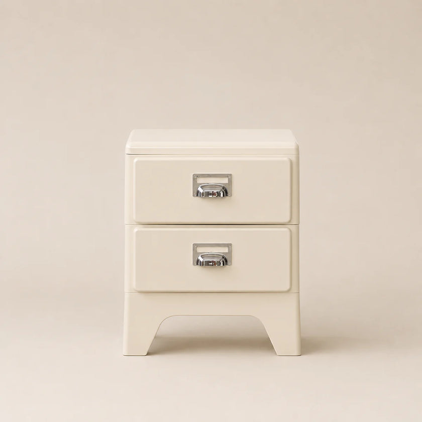 White nightstand with two drawers on a beige background