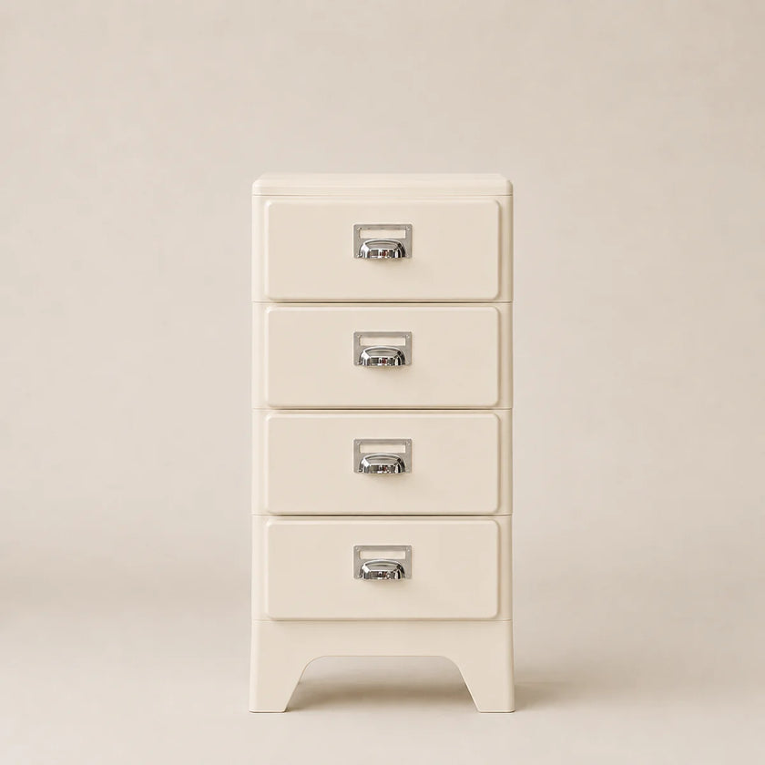 White four-drawer cabinet with silver handles on a beige background