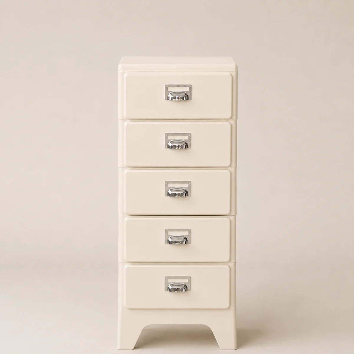 White five-drawer cabinet with silver handles on a beige background
