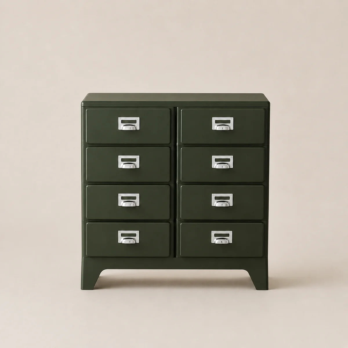 Green metal cabinet with multiple drawers on a beige background