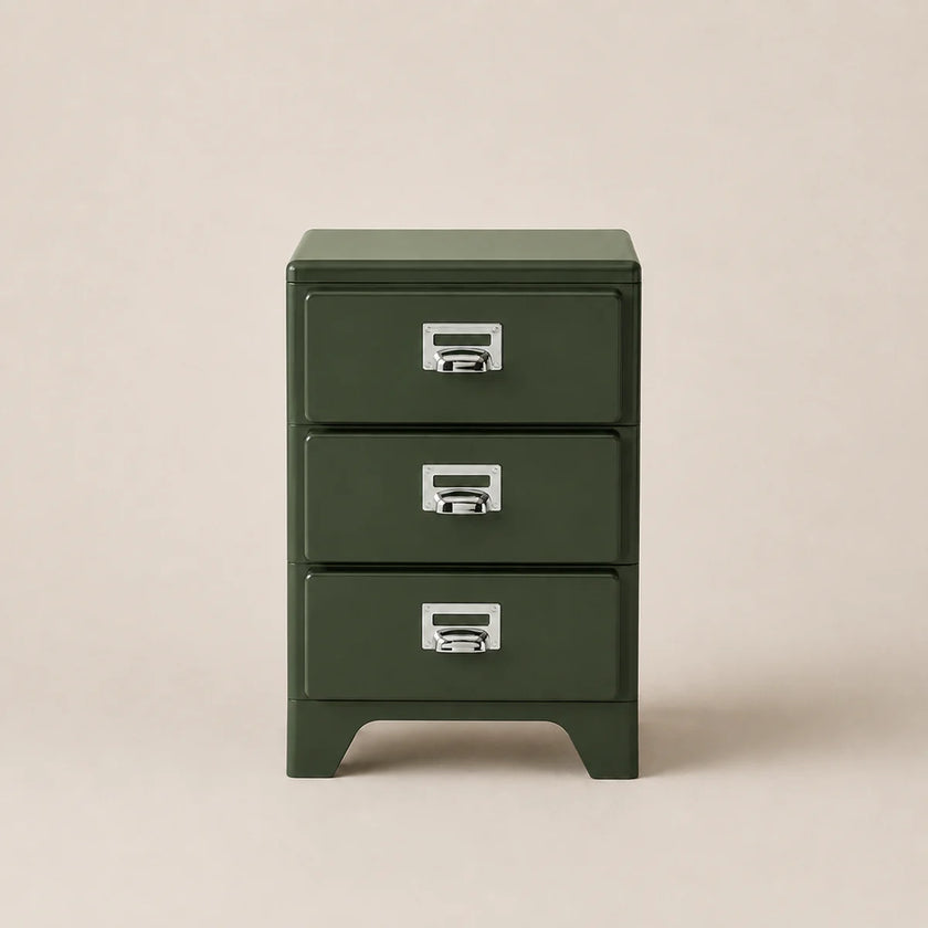 Green three-drawer filing cabinet on a beige background