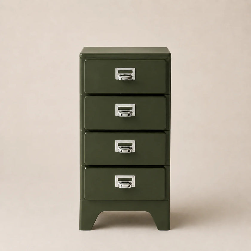 Green metal cabinet with four drawers on a beige background