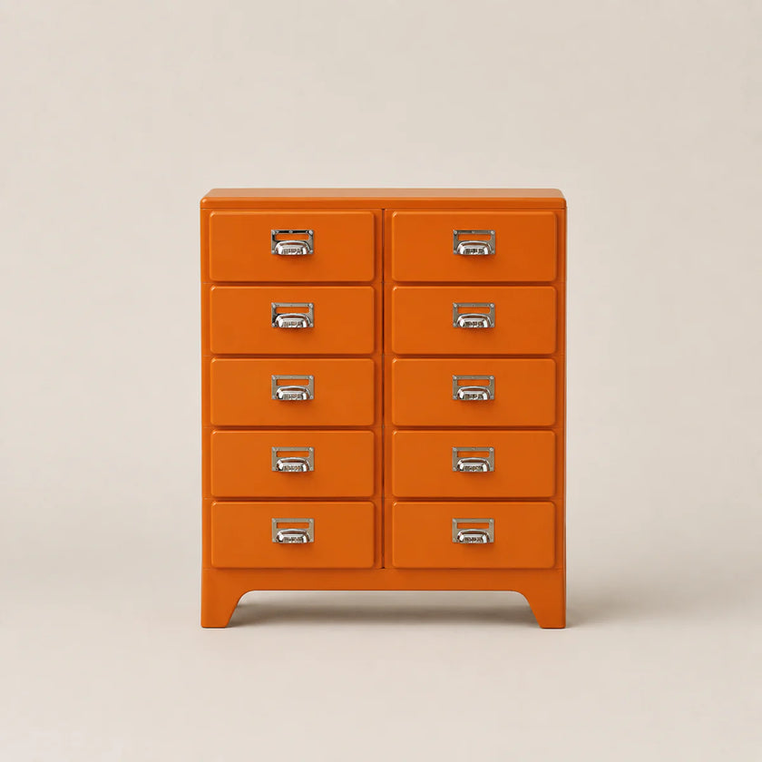 Orange dresser with multiple drawers on a beige background