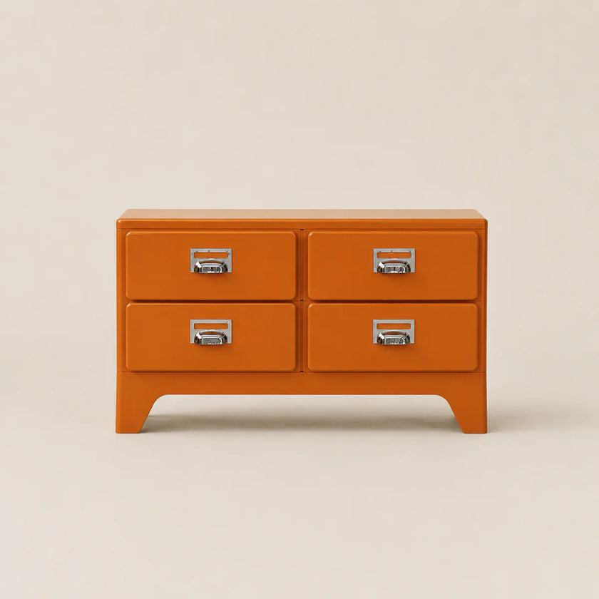 Orange dresser with four drawers on a beige background