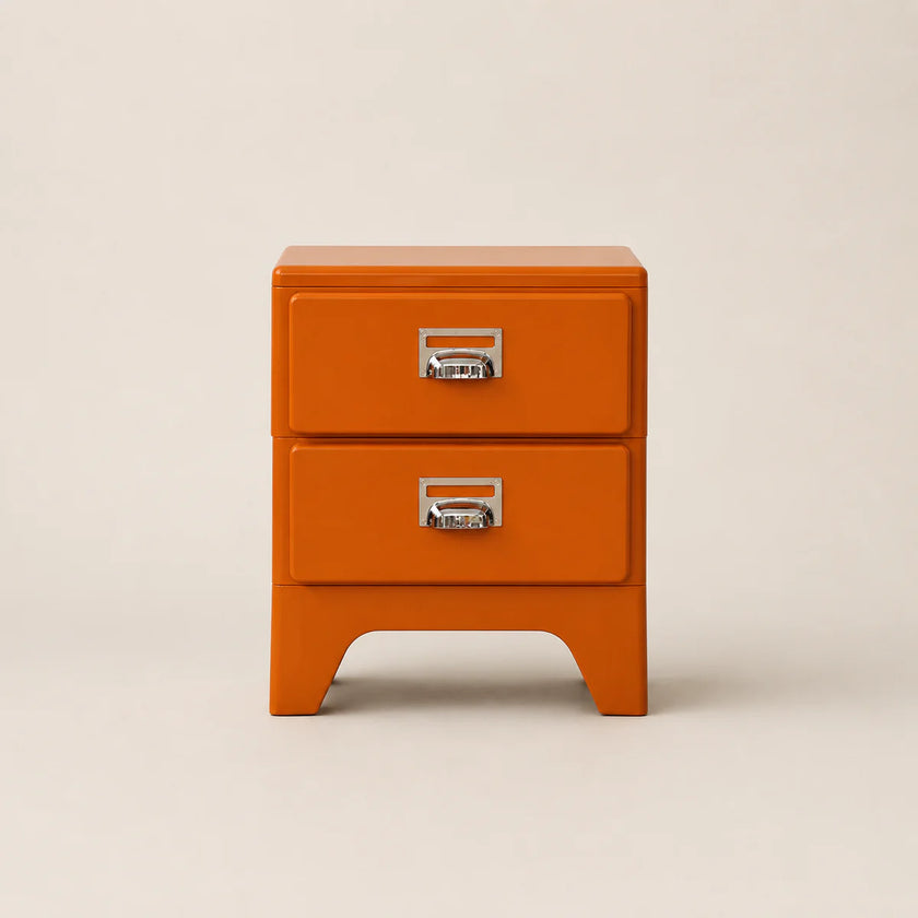 Orange two-drawer nightstand with metal handles on a beige background