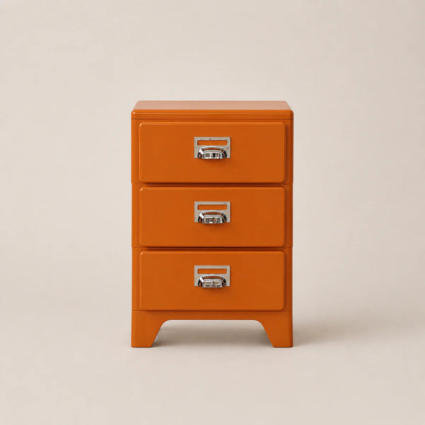 Orange three-drawer filing cabinet with metal handles on a beige background