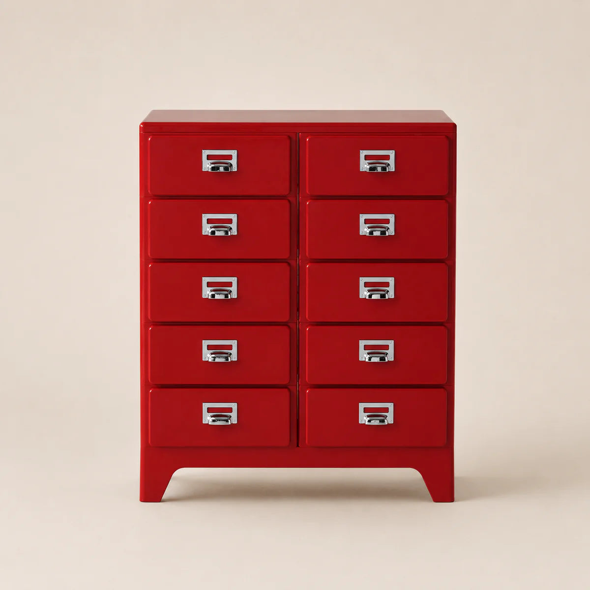 Red metal chest of drawers with multiple drawers on a beige background