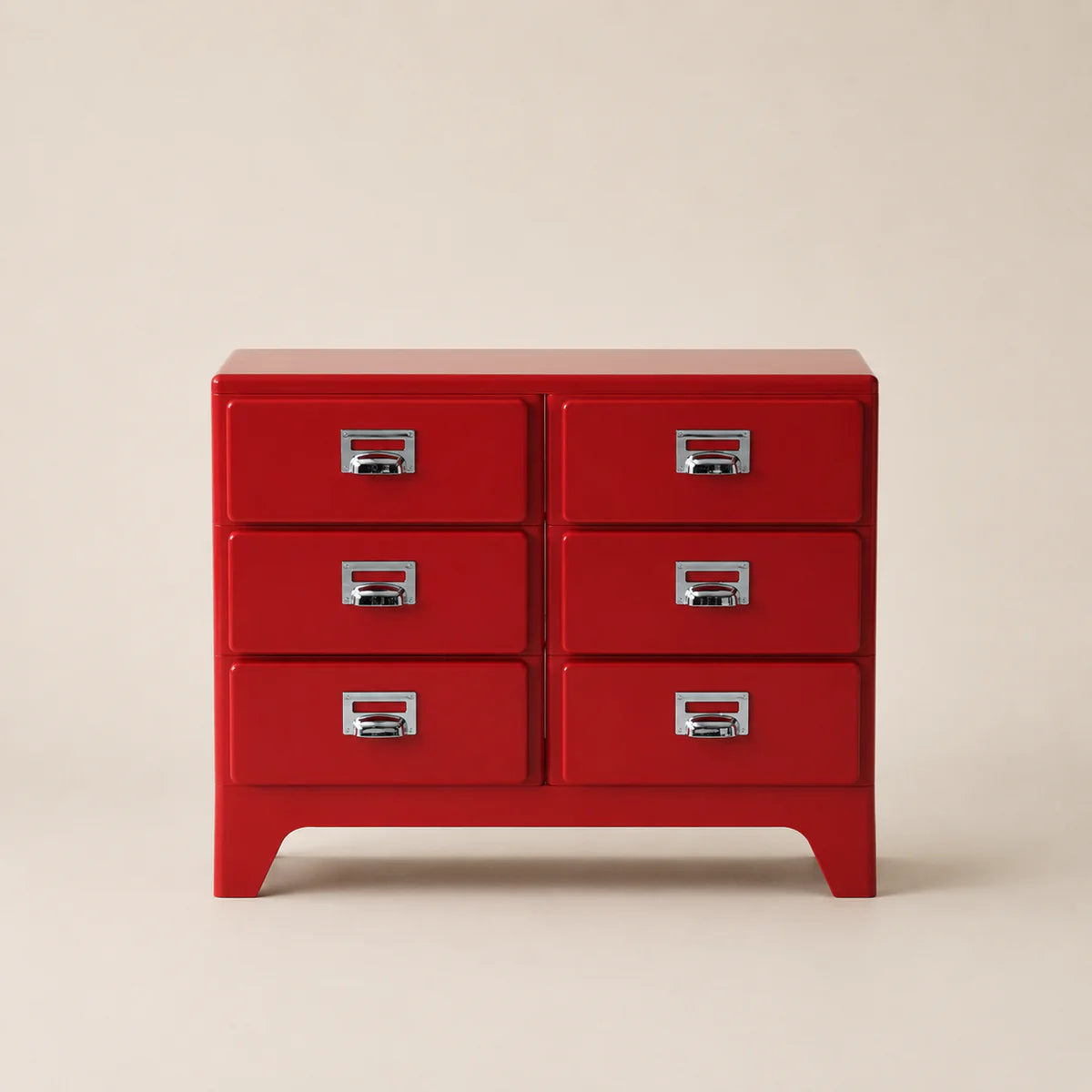 Red dresser with four drawers on a beige background