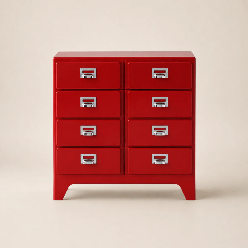 Red dresser with multiple drawers on a beige background