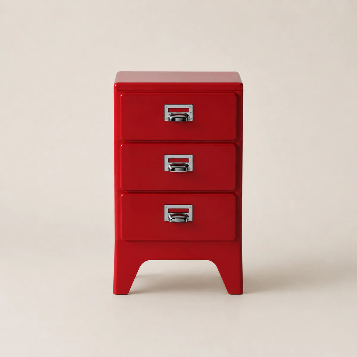 Red three-drawer cabinet on a beige background
