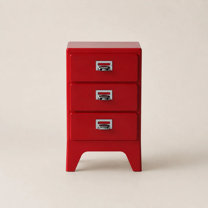 Red three-drawer cabinet on a beige background