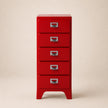 Red metal file cabinet with four drawers on a beige background