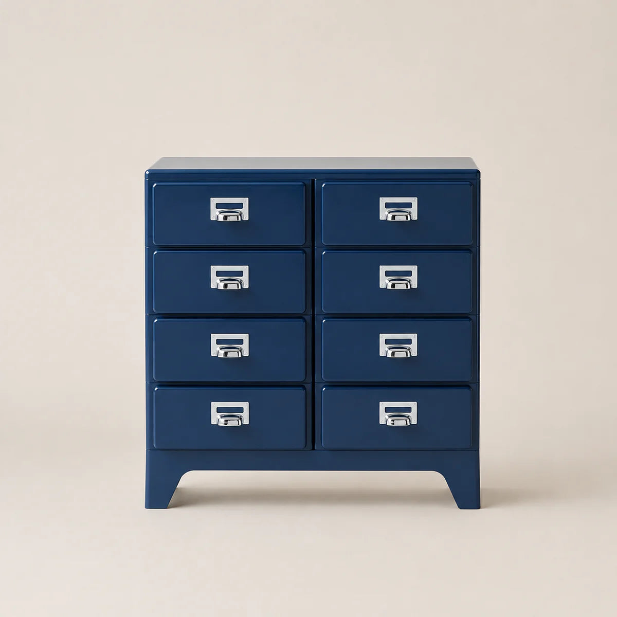 Blue dresser with multiple drawers on a beige background