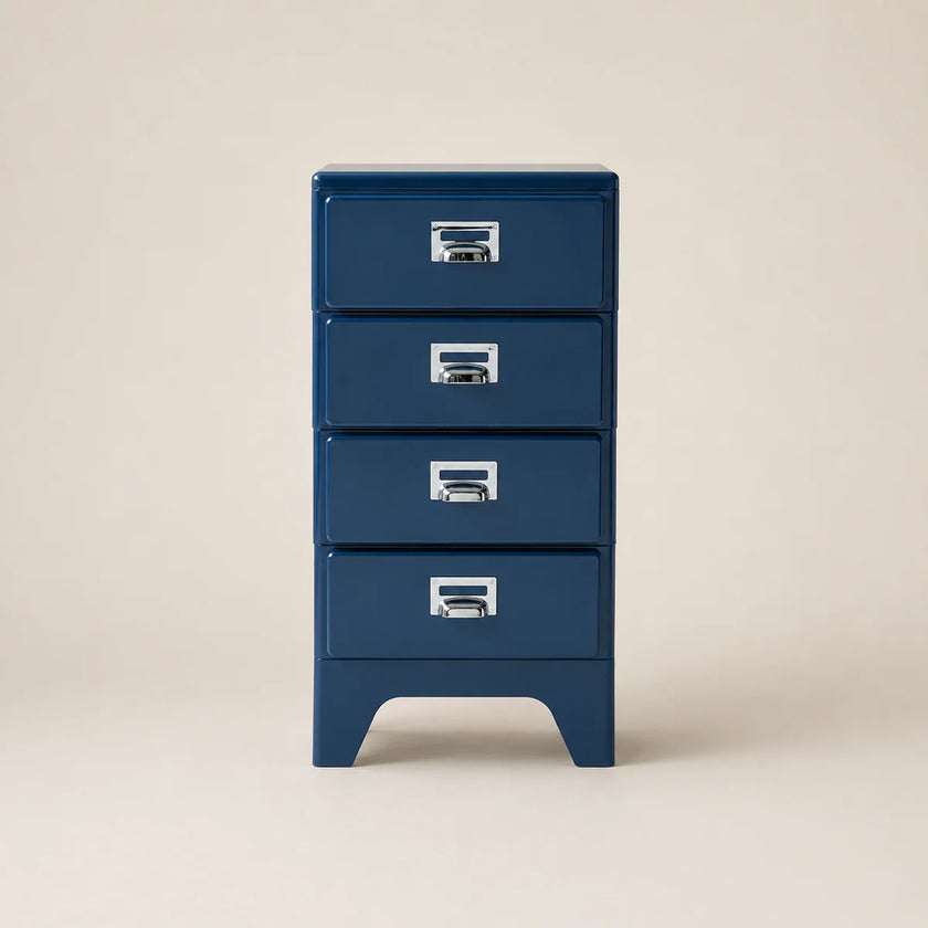 Blue four-drawer cabinet with silver handles on a beige background