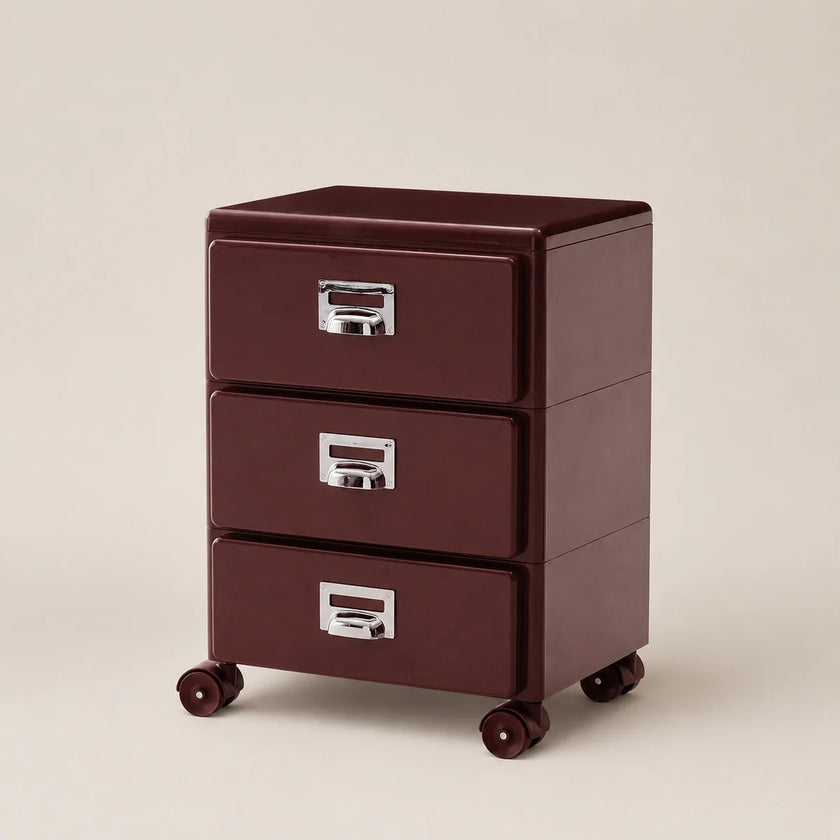 Brown file cabinet with three drawers on wheels against a beige background