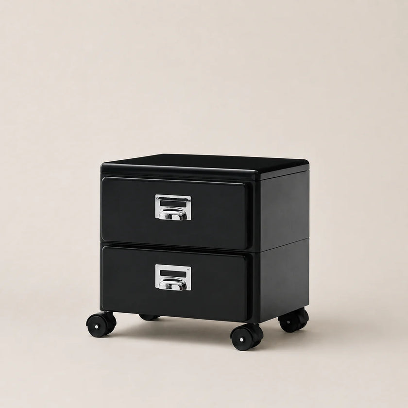 Black two-drawer filing cabinet on wheels with silver handles against a beige background