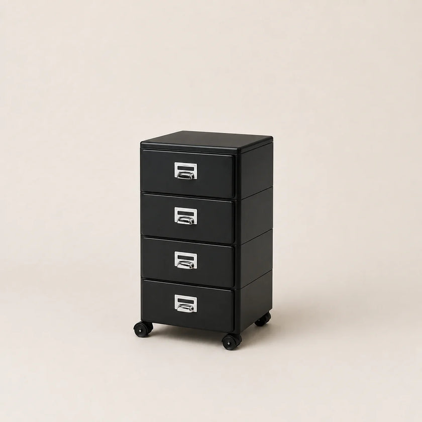 Black metal file cabinet with four drawers on a beige background
