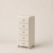 Beige five-drawer filing cabinet on wheels against a beige background
